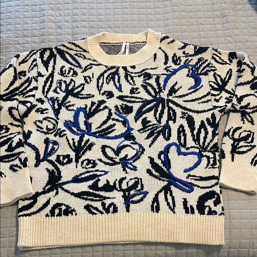 Anthropologie Cream Crewneck Sweater with Black and Royal Blue Motifs